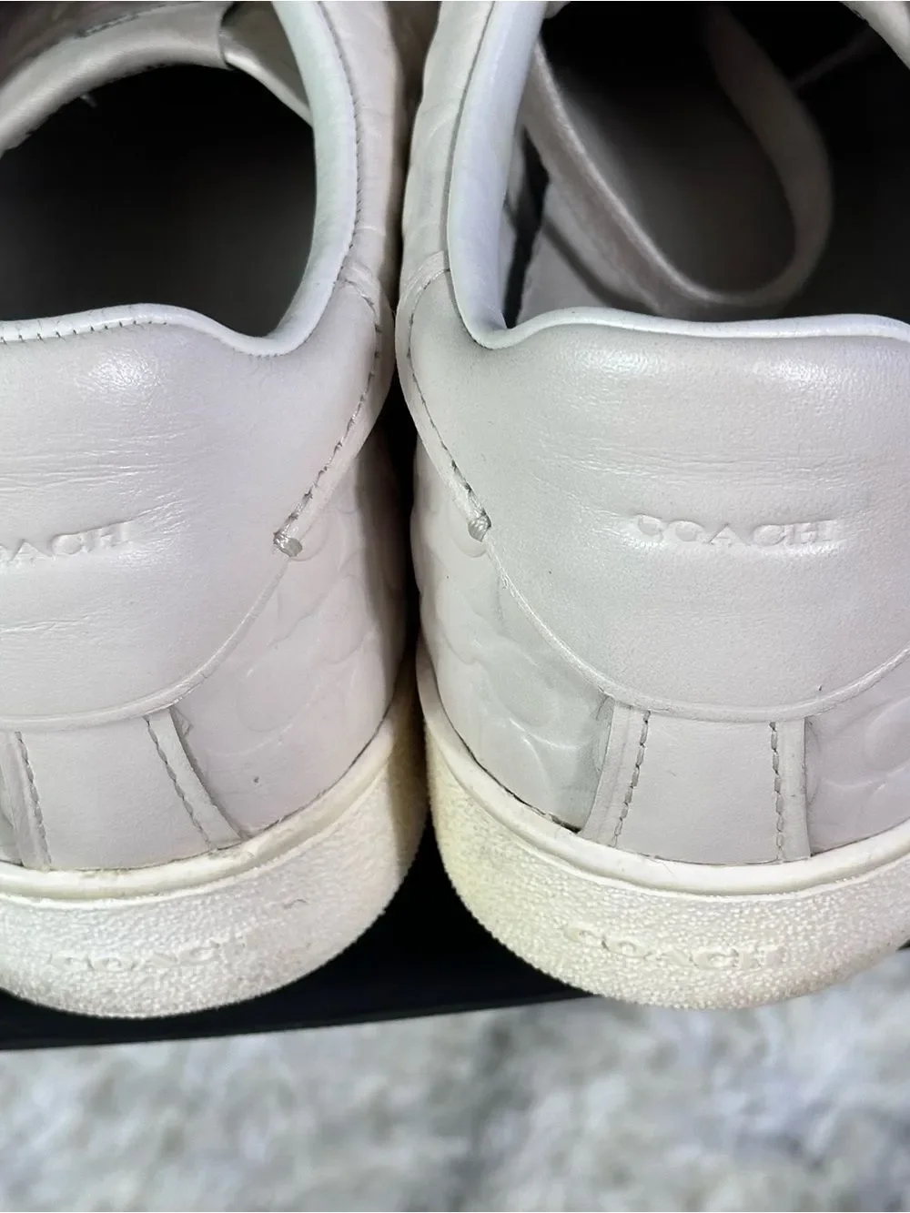 Coach Women's cream leather Signature Embossed Sneakers